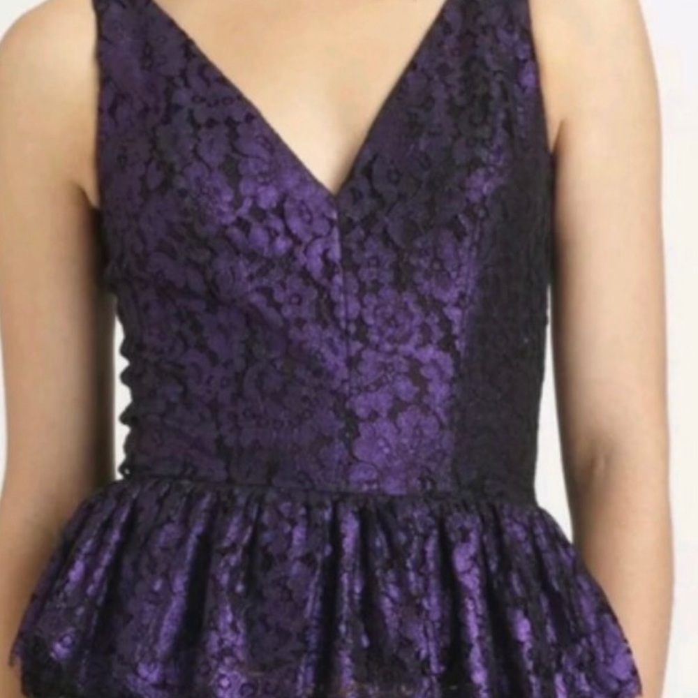 Robert Rodriguez purple lace sleeveless peplum blouse.